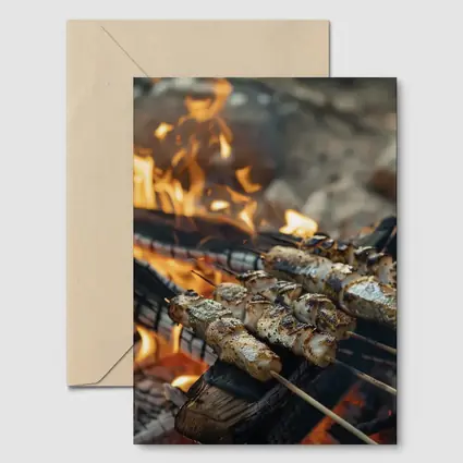 Grilled Skewers Over Open Campfire Flames