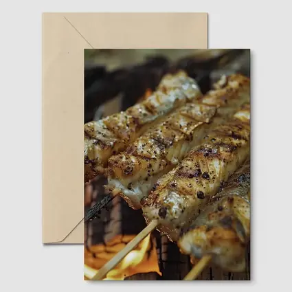 Grilled Fish Skewers Over Open Campfire