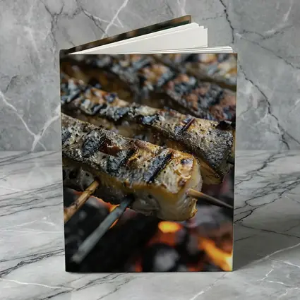 Grilled Fish Skewers Over Open Fire
