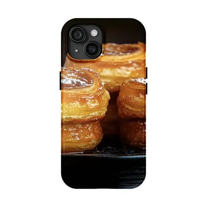 Golden Flaky Pastries On Dark Plate