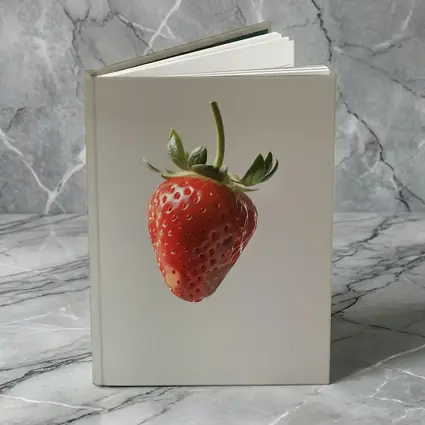 Red Strawberry Floating on Neutral Background