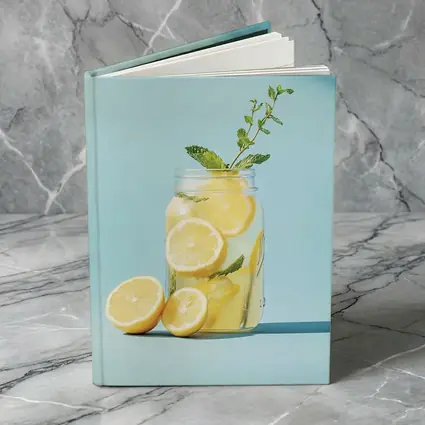 Lemon Mint Mason Jar Blue Background