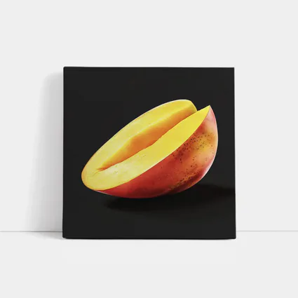 Sliced Mango Half on Dark Background