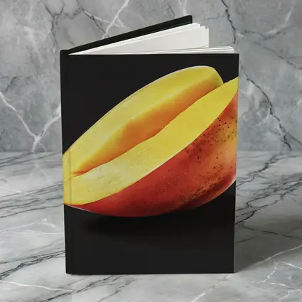 Sliced Mango Half on Dark Background