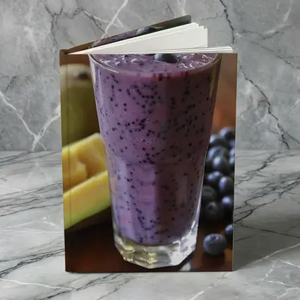 Blueberry Mango Smoothie on Wooden Table