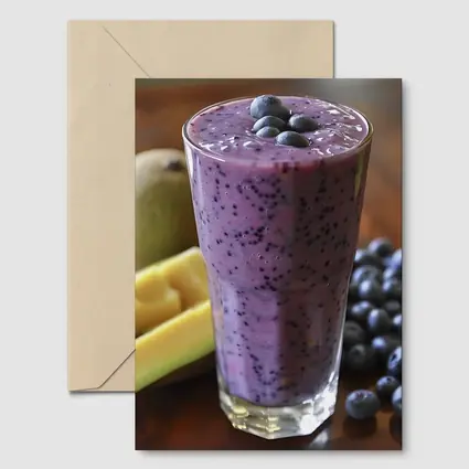 Blueberry Mango Smoothie on Wooden Table