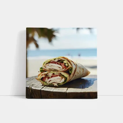 Chicken Wrap Halved on Beach Background