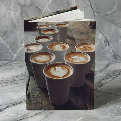 Latte Art Coffee Cups on Wooden Table