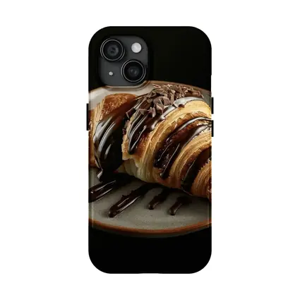 Chocolate Drizzled Croissant On Dark Plate