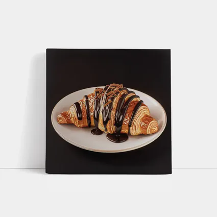 Chocolate Drizzled Croissant On White Plate
