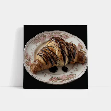 Chocolate Drizzled Croissant On Floral Plate