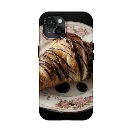 Chocolate Drizzled Croissant On Floral Plate