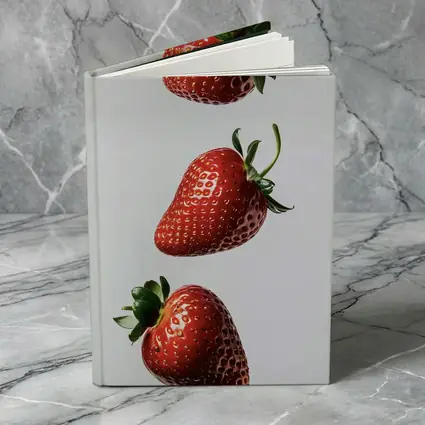 Three Fresh Strawberries Falling Gray Background