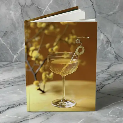 Champagne Coupe Glass Yellow Floral Background