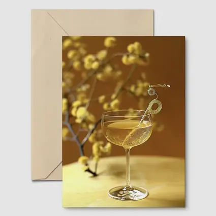 Champagne Coupe Glass Yellow Floral Background