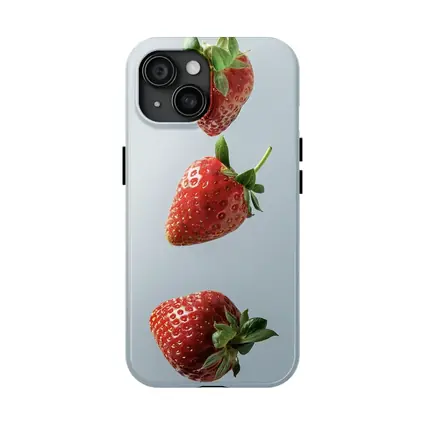 Three Red Strawberries Falling Gray Background