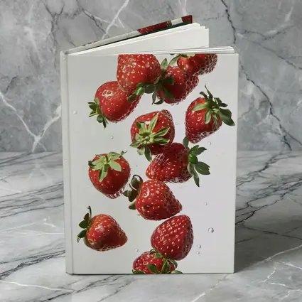 Fresh Red Strawberries Falling on White