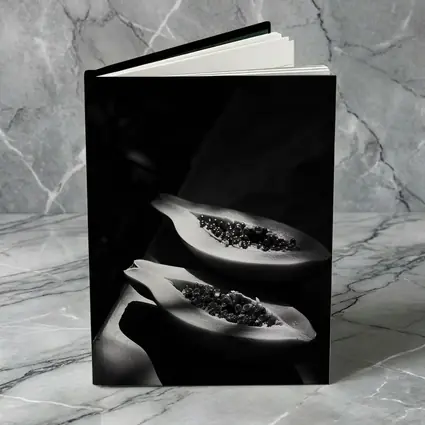 Black And White Papaya Halves Dark Background