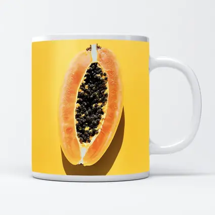 Sliced Papaya On Yellow Background
