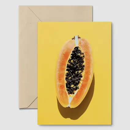 Sliced Papaya On Yellow Background