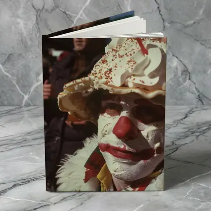 Clown With Pie Hat City Street