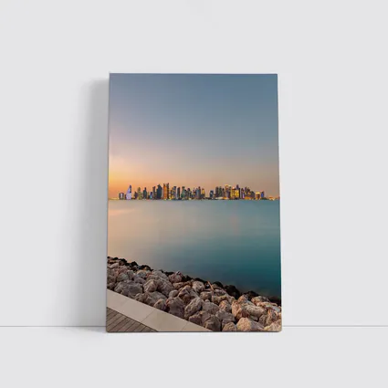 Doha Qatar Skyline at Sunset Over Water