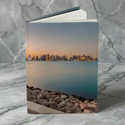 Doha Qatar Skyline at Sunset Over Water