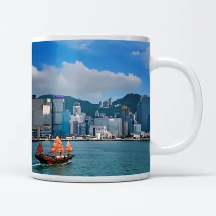 Hong Kong Harbor Skyline with Traditional Junk Boat