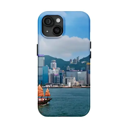 Hong Kong Harbor Skyline with Traditional Junk Boat