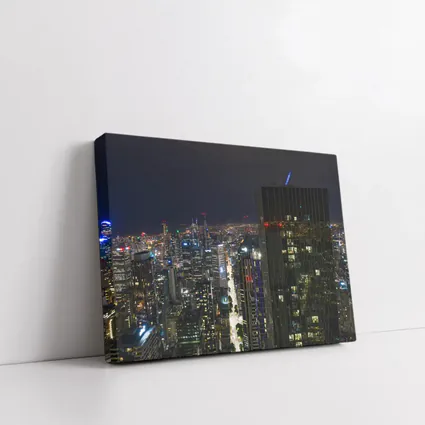 Melbourne City Skyline Glowing At Night