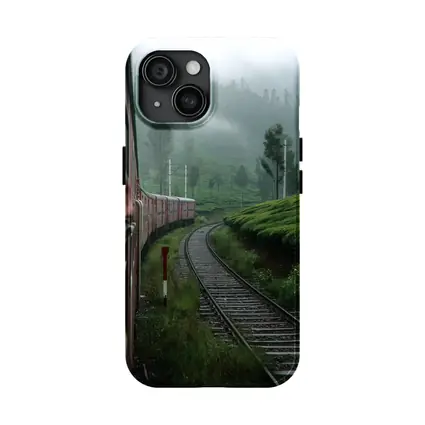 Red Train Winding Through Misty Tea Plantations