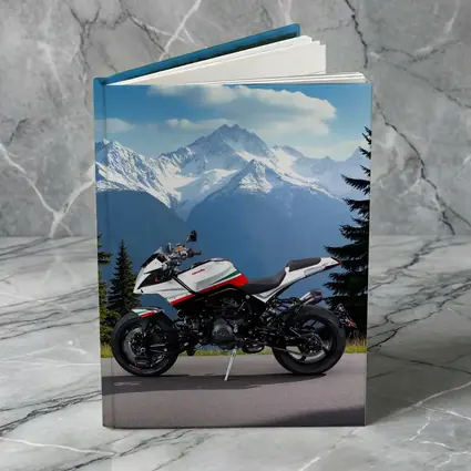 Aprilia Motorcycle Parked Against Snowy Mountains