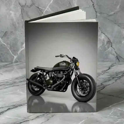 Olive Green Cafe Racer Motorcycle Studio Shot