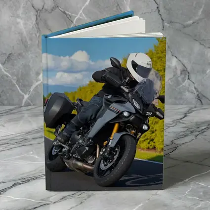 Yamaha Tracer Rider Leaning Into Corner Road