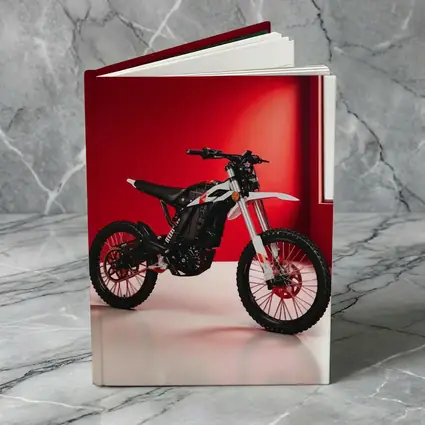 Electric Dirt Bike Against Bold Red Wall