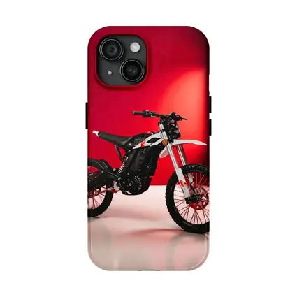 Electric Dirt Bike Against Bold Red Wall