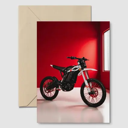 Electric Dirt Bike Against Bold Red Wall