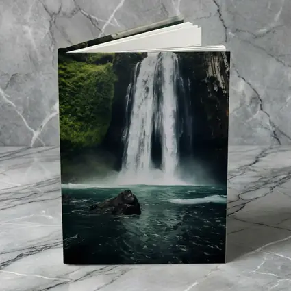 Massive Waterfall Crashing Into Turquoise Pool