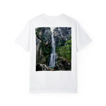 Tall Waterfall Cascading Down Rocky Cliffs
