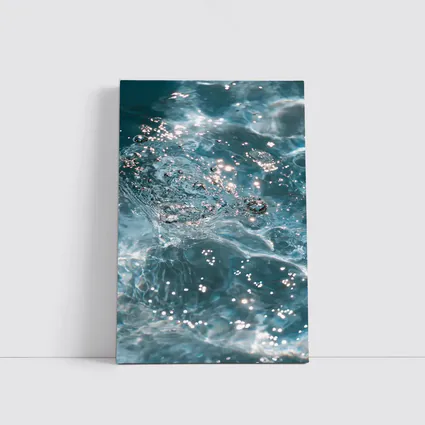 Clear Blue Water Surface with Sparkling Light