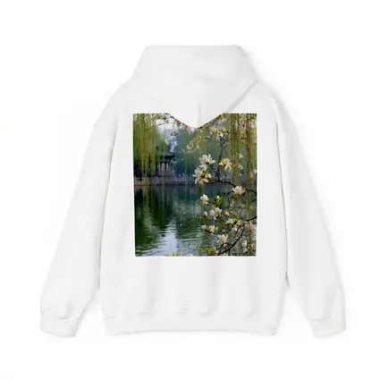 Magnolia Blossoms Over Calm Green Lake