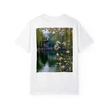 Magnolia Blossoms Over Calm Green Lake