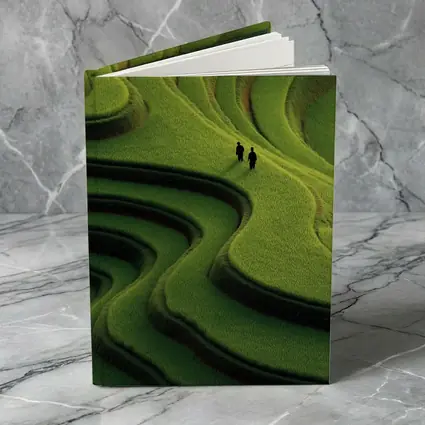 Two Figures Walking Green Rice Field Terraces