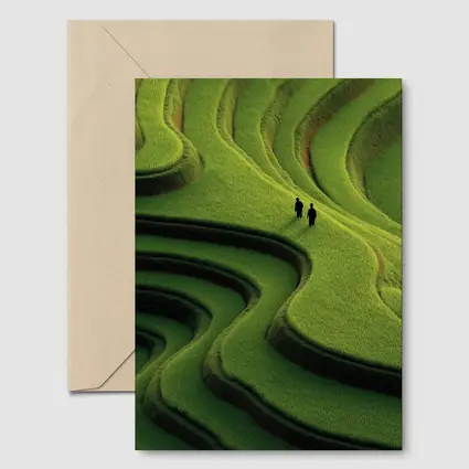 Two Figures Walking Green Rice Field Terraces