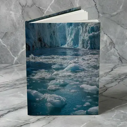 Glacier Calving Into Icy Blue Waters