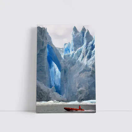Red Boat Near Massive Blue Glacier Wall
