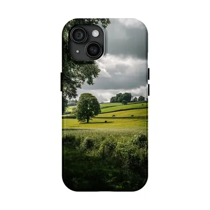 Rolling Green Fields Under Stormy Cloudy Sky