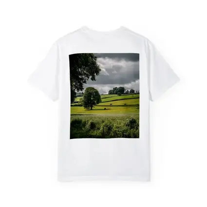 Rolling Green Fields Under Stormy Cloudy Sky
