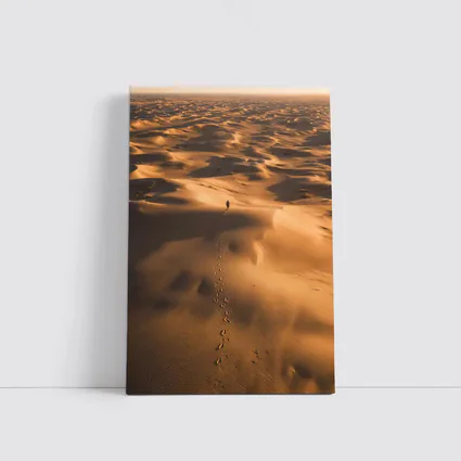 Lone Figure Walking Vast Golden Desert Dunes