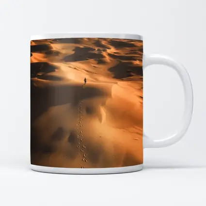 Lone Figure Walking Vast Golden Desert Dunes